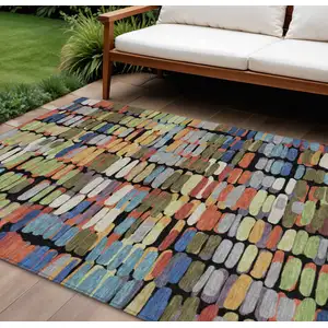 Photo of Black Green And Blue Abstract Washable Indoor Outdoor Area Rug