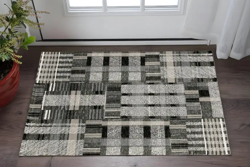 Black And Gray Geometric Area Rug Photo 1