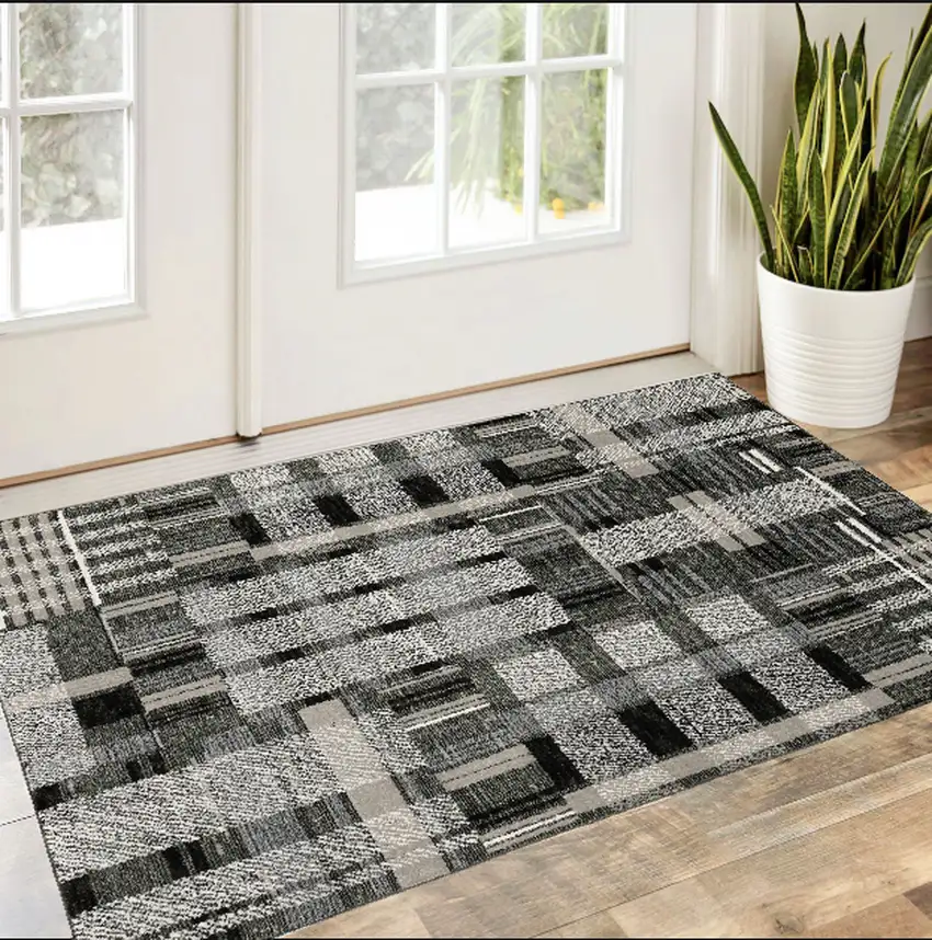 Gray and Black Geometric Power Loom Area Rug Photo 1