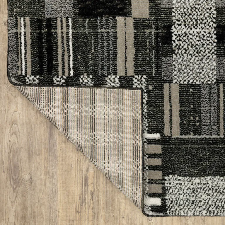Black Grey And Ivory Geometric Power Loom Stain Resistant Runner Rug Photo 5