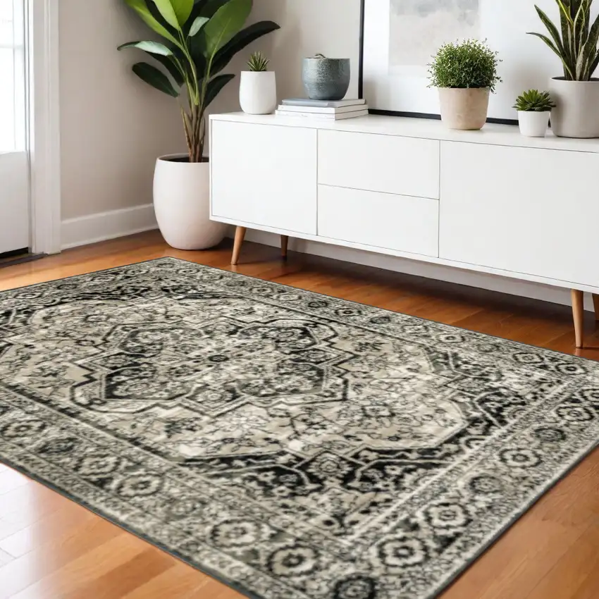 Black Grey Tan And Ivory Oriental Power Loom Stain Resistant Area Rug Photo 1