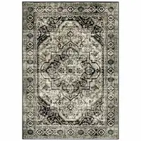 Photo of Black Grey Tan And Ivory Oriental Power Loom Stain Resistant Area Rug