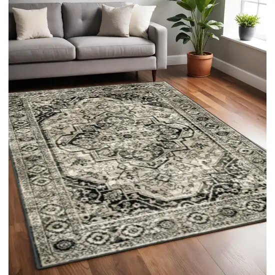 Black Grey Tan And Ivory Oriental Power Loom Stain Resistant Area Rug Photo 1