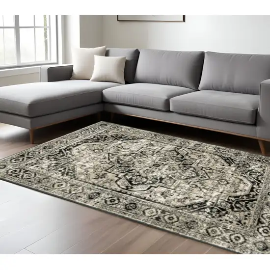 Black Grey Tan And Ivory Oriental Power Loom Stain Resistant Area Rug Photo 1
