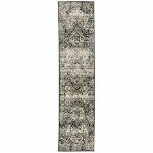 Photo of Black Grey Tan And Ivory Oriental Power Loom Stain Resistant Runner Rug