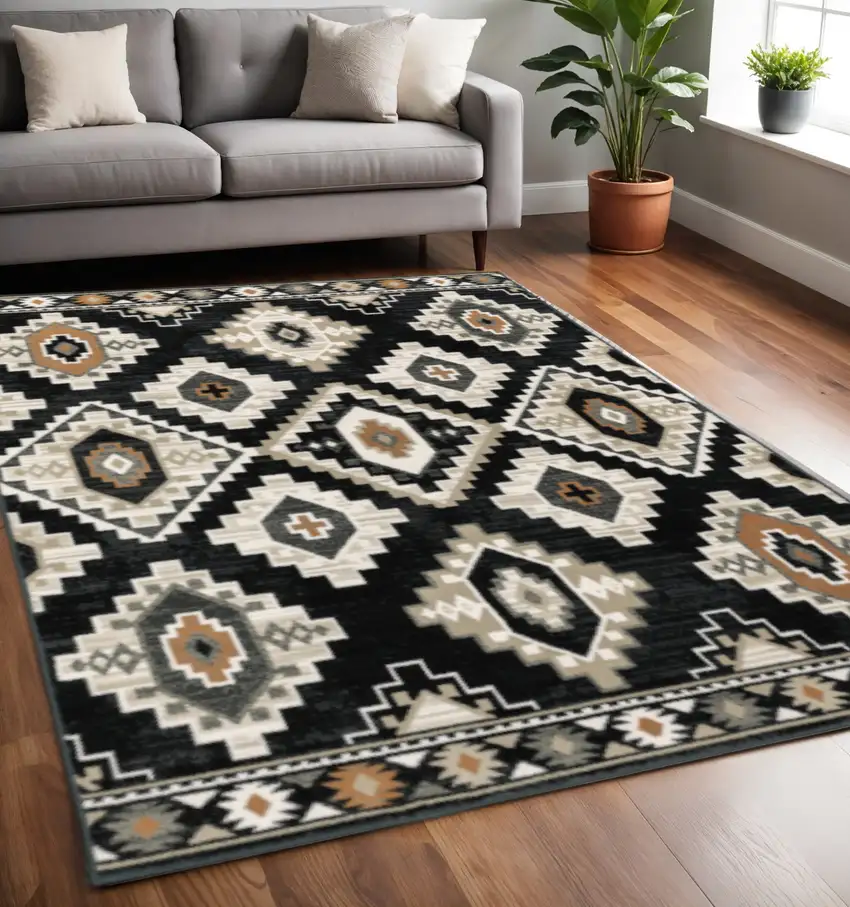 Black Grey Tan Orange And Ivory Southwestern Power Loom Stain Resistant Area Rug Photo 1