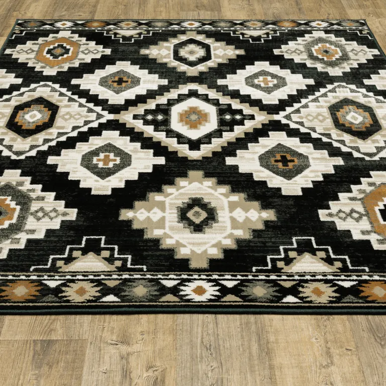 Black Grey Tan Orange And Ivory Southwestern Power Loom Stain Resistant Area Rug Photo 5
