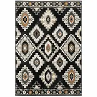 Photo of Black Grey Tan Orange And Ivory Southwestern Power Loom Stain Resistant Area Rug
