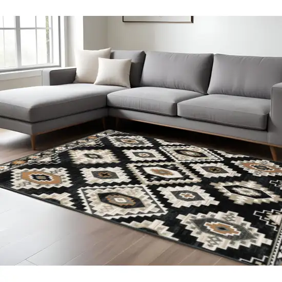 Black Grey Tan Orange And Ivory Southwestern Power Loom Stain Resistant Area Rug Photo 1