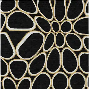 Photo of Black Ivory And Beige Abstract Washable Indoor Outdoor Area Rug