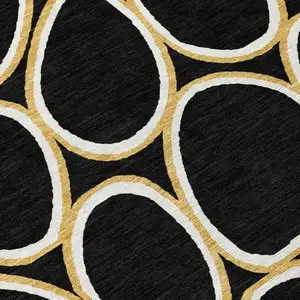 Photo of Black Ivory And Beige Abstract Washable Indoor Outdoor Area Rug