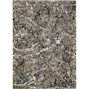 Photo of Black Ivory And Beige Abstract Washable Indoor Outdoor Area Rug