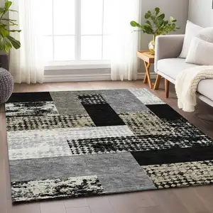 Photo of Black Ivory And Beige Geometric Washable Area Rug With UV Protection