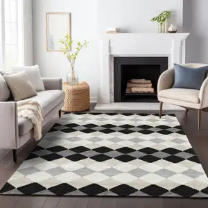 Photo of Black Ivory And Beige Geometric Washable Indoor Outdoor Area Rug