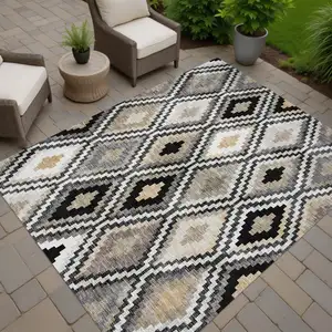 Photo of Black Ivory And Beige Geometric Washable Indoor Outdoor Area Rug