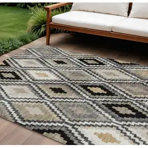 Photo of Black Ivory And Beige Geometric Washable Indoor Outdoor Area Rug