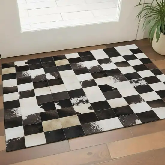 Black Ivory And Beige Patchwork Washable Area Rug With UV Protection Photo 1