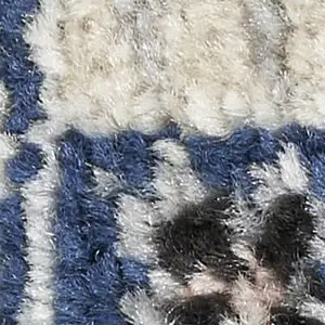 Photo of Black Ivory And Blue Floral Area Rug