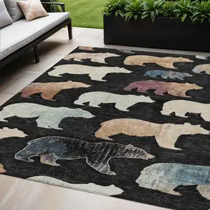 Photo of Black Ivory And Brown Animal Print Washable Indoor Outdoor Area Rug