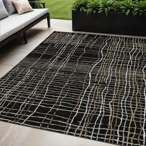 Photo of Black Ivory And Brown Striped Washable Indoor Outdoor Area Rug