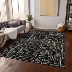 Photo of Black Ivory And Brown Striped Washable Indoor Outdoor Area Rug