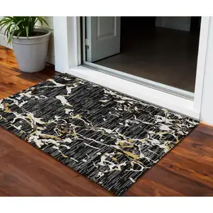 Photo of Black Ivory And Brown Striped Washable Indoor Outdoor Area Rug