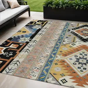 Photo of Black Ivory And Copper Aztec Washable Indoor Outdoor Area Rug