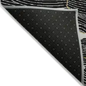 Photo of Black Ivory And Gold Abstract Washable Indoor Outdoor Area Rug