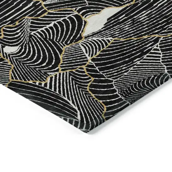 Black Ivory And Gold Abstract Washable Indoor Outdoor Area Rug Photo 3