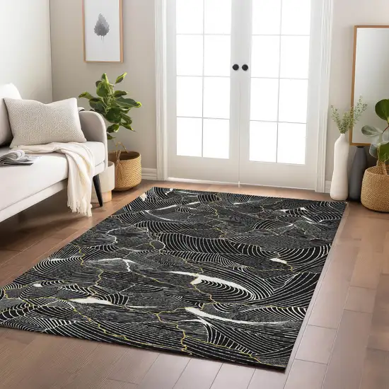 Black Ivory And Gold Abstract Washable Indoor Outdoor Area Rug Photo 9