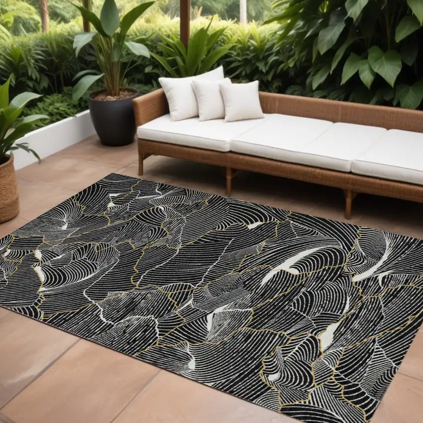 Black Ivory And Gold Abstract Washable Indoor Outdoor Area Rug Photo 1