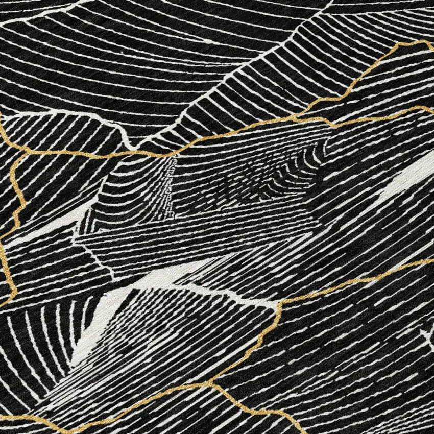 Black Ivory And Gold Abstract Washable Indoor Outdoor Area Rug Photo 4