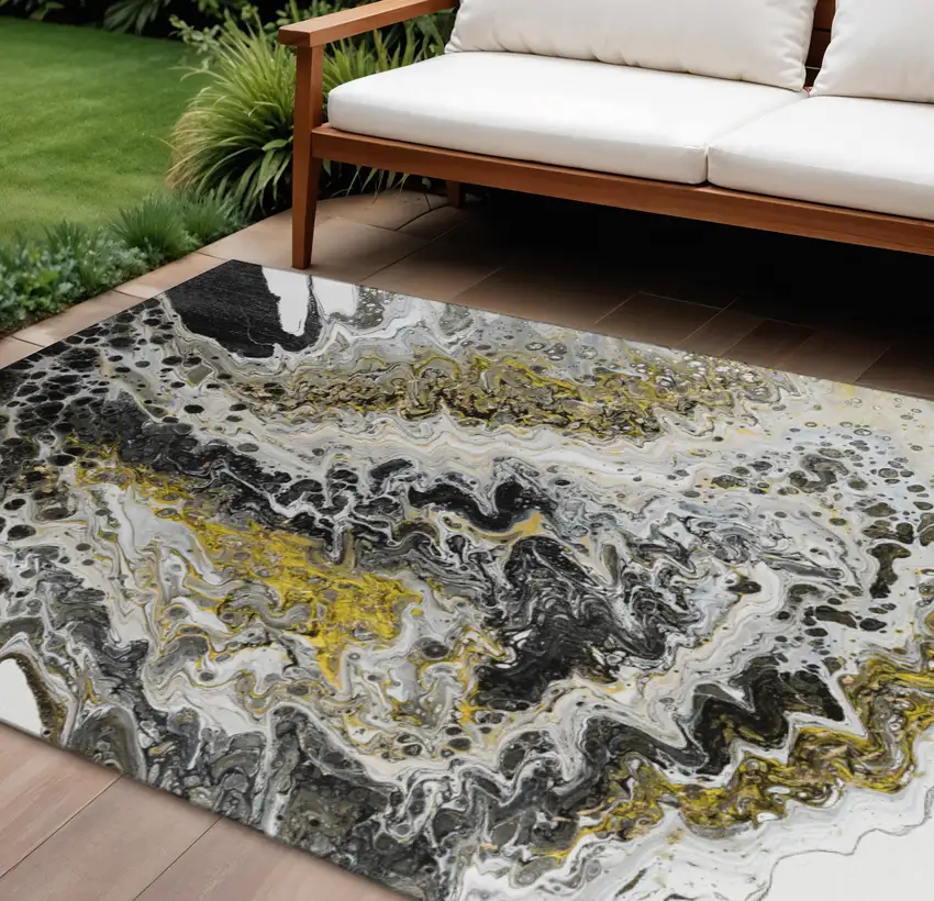 Black Ivory And Gold Abstract Washable Indoor Outdoor Area Rug Photo 1