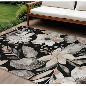 Photo of Black Ivory And Gold Floral Washable Indoor Outdoor Area Rug