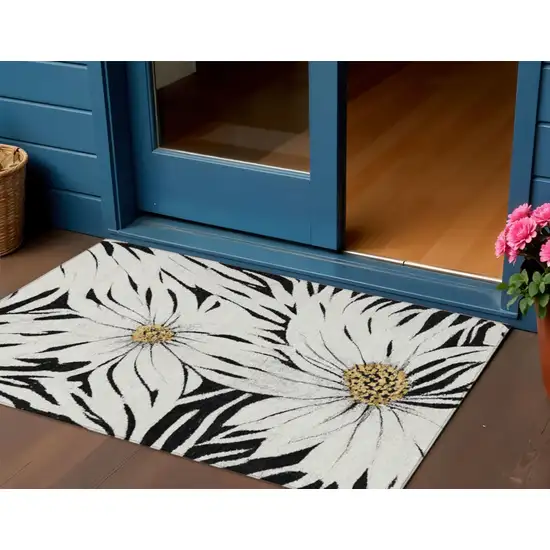 Black Ivory And Gold Floral Washable Indoor Outdoor Area Rug Photo 1