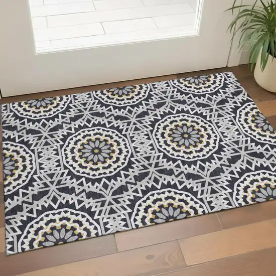 Black Ivory And Gold Geometric Washable Area Rug With UV Protection Photo 1