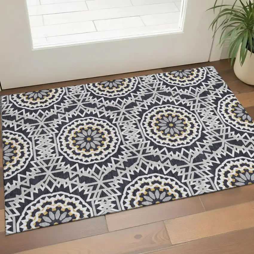 Black Ivory And Gold Geometric Washable Area Rug With UV Protection Photo 1