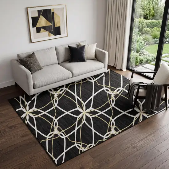 Black Ivory And Gold Geometric Washable Area Rug With UV Protection Photo 1