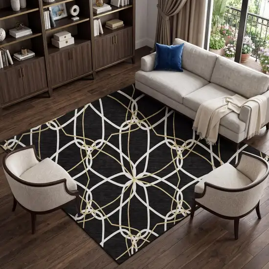 Black Ivory And Gold Geometric Washable Area Rug With UV Protection Photo 1