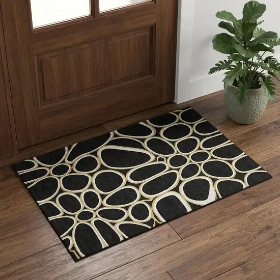 Black Ivory And Gold Geometric Washable Area Rug With UV Protection Photo 1