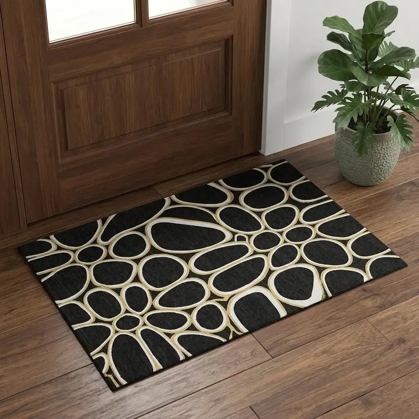 Black Ivory And Gold Geometric Washable Area Rug With UV Protection Photo 1