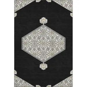 Photo of Black Ivory And Gold Oriental Washable Area Rug With UV Protection