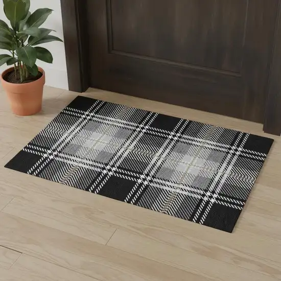 Black Ivory And Gold Plaid Washable Area Rug With UV Protection Photo 1