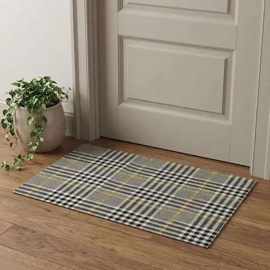 Black Ivory And Gold Plaid Washable Area Rug With UV Protection Photo 1