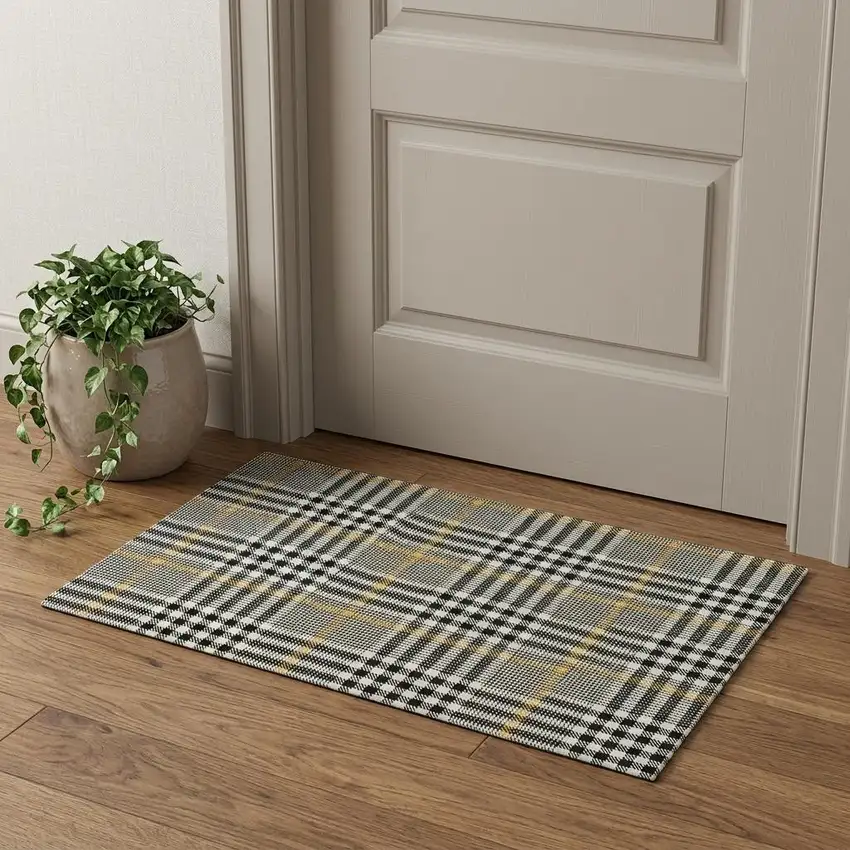Black Ivory And Gold Plaid Washable Area Rug With UV Protection Photo 1
