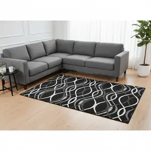 Photo of Black Ivory And Gray Abstract Washable Area Rug With UV Protection