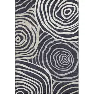 Photo of Black Ivory And Gray Abstract Washable Area Rug With UV Protection