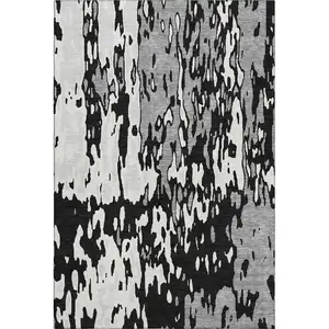 Photo of Black Ivory And Gray Abstract Washable Area Rug With UV Protection