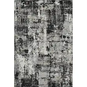 Photo of Black Ivory And Gray Abstract Washable Area Rug With UV Protection