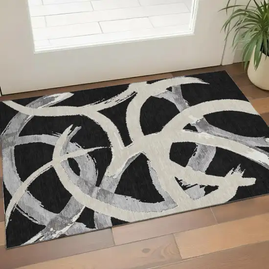 Black Ivory And Gray Abstract Washable Area Rug With UV Protection Photo 1